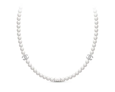 Колье из белого круглого жемчуга со вставками из серебра. Жемчужины 7-7,5 мм