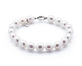 Браслет из белого рисообразного речного жемчуга класса ААА. Жемчужины 7-7,5 мм