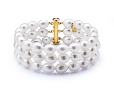 Браслет в 3 ряда из белого речного рисообразного жемчуга. Жемчужины 6,5-7 мм