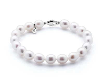 Браслет из белого рисообразного речного жемчуга класса ААА. Жемчужины 7-7,5 мм