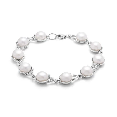 Браслет из серебра с белыми речными жемчужинами. Жемчужины 8-8,5 мм