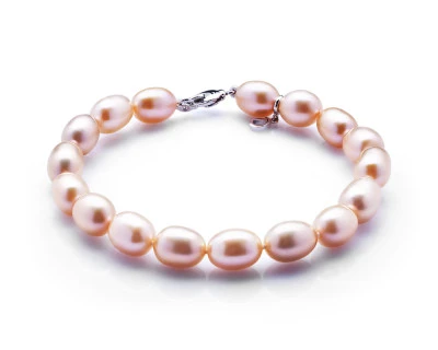 Браслет из розового рисообразного речного жемчуга. Жемчужины 7,5-8 мм