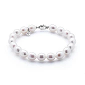 Браслет из белого рисообразного речного жемчуга. Жемчужины 6,5-7 мм